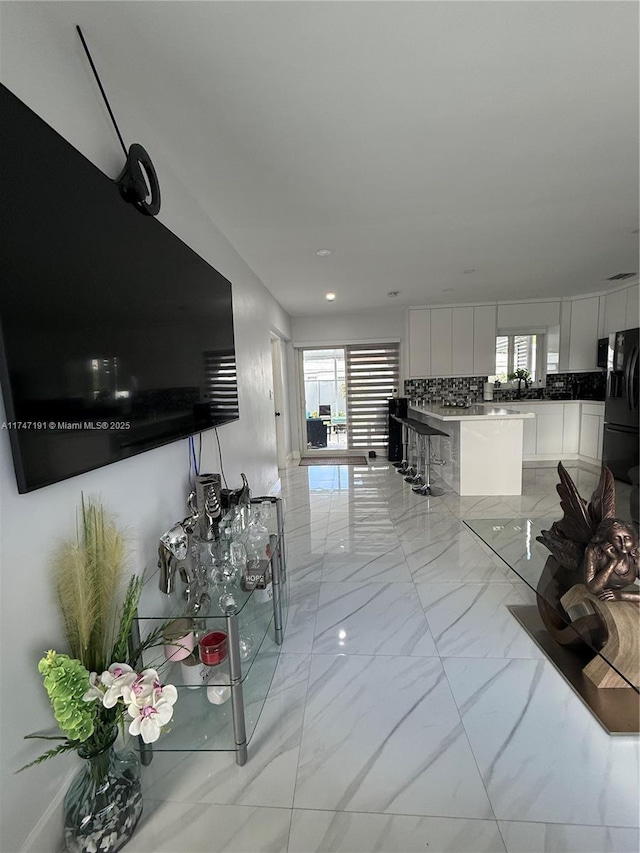 interior space with marble finish floor