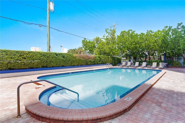 community pool featuring a patio