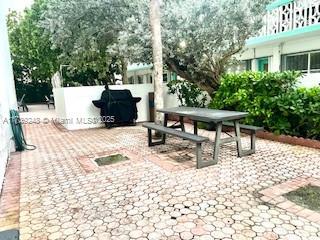 view of patio featuring outdoor dining space