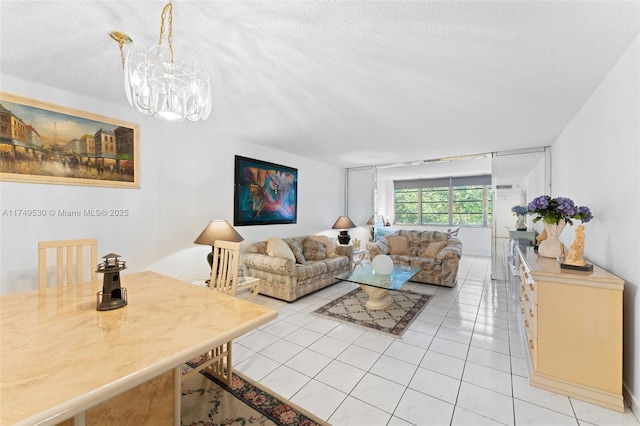 445 NE 195th St Unit 324, Miami, FL 33179 - living room with a chandelier, a textured ceiling, and light tile patterned flooring