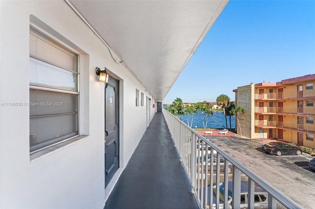 445 NE 195th St Unit 324, Miami, FL 33179 - balcony featuring a water view