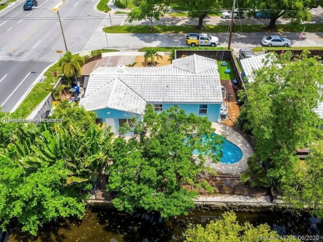 birds eye view of property featuring a water view