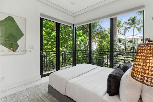 bedroom featuring multiple windows