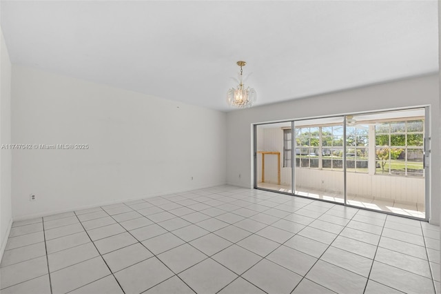 17084 SW 112th Ct Unit V3142, Miami, FL 33157 - unfurnished room with a chandelier and light tile patterned flooring