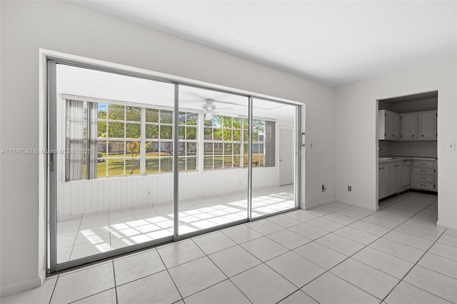 17084 SW 112th Ct Unit V3142, Miami, FL 33157 - unfurnished dining area featuring healthy amount of natural light, ceiling fan, light tile patterned flooring, and baseboards