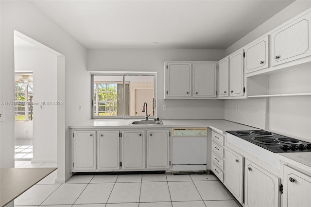 17084 SW 112th Ct Unit V3142, Miami, FL 33157 - kitchen with dishwasher, a sink, black electric cooktop, light tile patterned floors, and light countertops