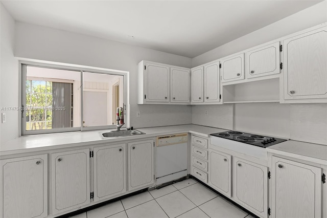 17084 SW 112th Ct Unit V3142, Miami, FL 33157 - kitchen with dishwasher, a sink, black electric stovetop, light tile patterned flooring, and light countertops