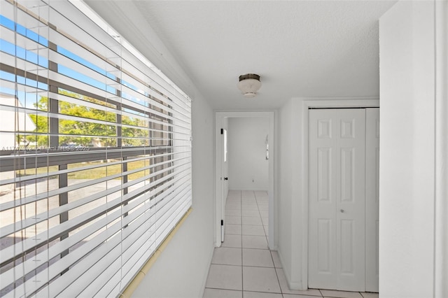 17084 SW 112th Ct Unit V3142, Miami, FL 33157 - hallway with light tile patterned floors