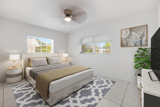 17084 SW 112th Ct Unit V3142, Miami, FL 33157 - bedroom featuring light tile patterned floors, a ceiling fan, and baseboards