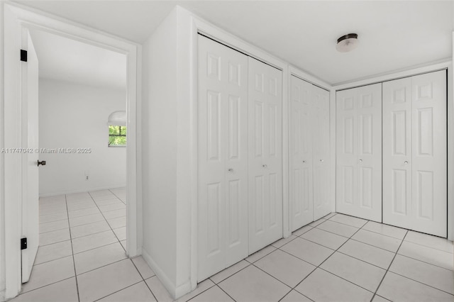 17084 SW 112th Ct Unit V3142, Miami, FL 33157 - corridor with light tile patterned floors and baseboards
