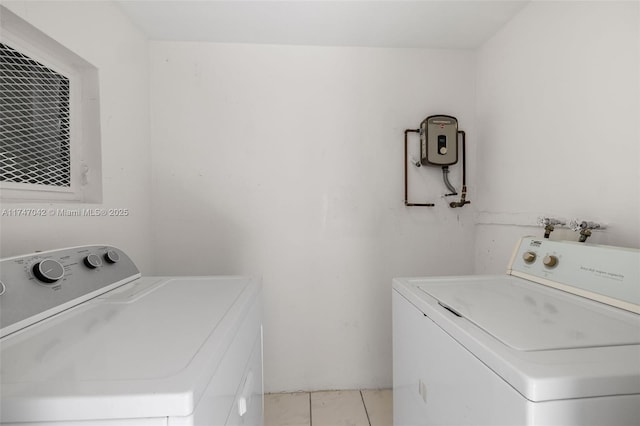 17084 SW 112th Ct Unit V3142, Miami, FL 33157 - washroom with washing machine and dryer and light tile patterned floors