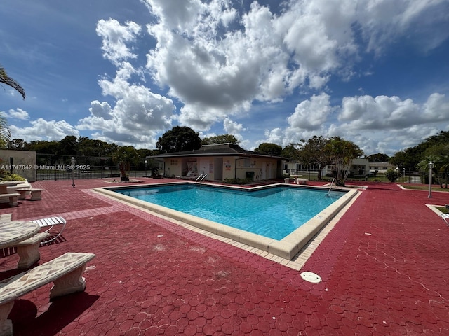 17084 SW 112th Ct Unit V3142, Miami, FL 33157 - community pool with a patio