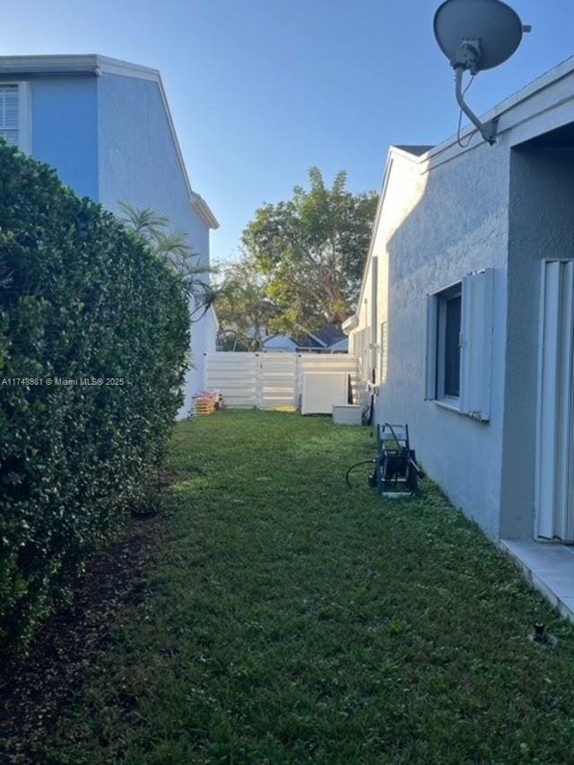 view of yard with fence