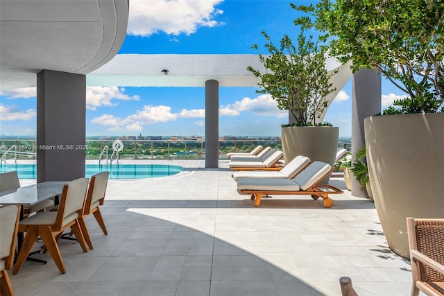 view of patio / terrace with a community pool