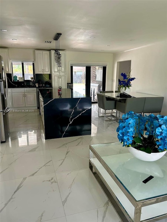 living room featuring marble finish floor