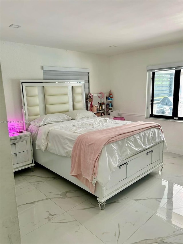 bedroom with marble finish floor