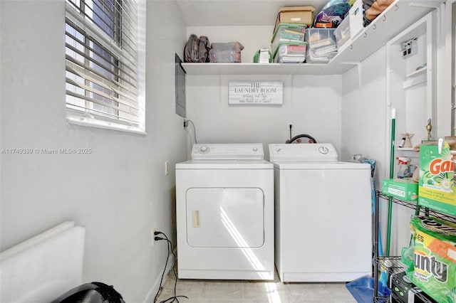 washroom featuring laundry area and washing machine and dryer