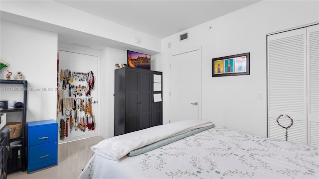 7875 NW 107th Ave Unit 511, Doral, FL 33178 - bedroom featuring a closet and visible vents