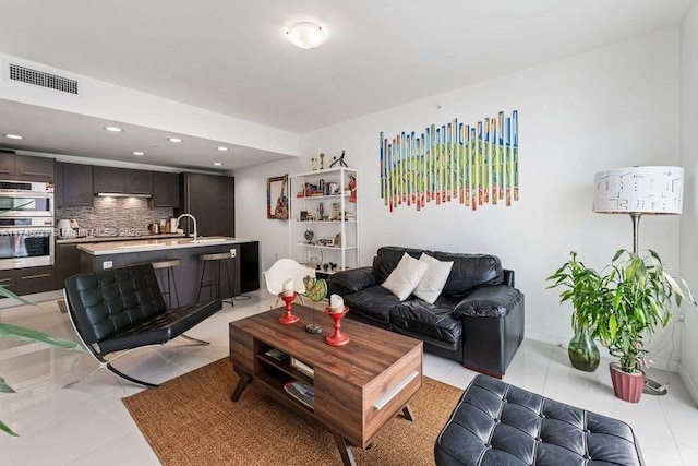 7875 NW 107th Unit 705, Doral, FL 33178 - living area featuring light tile patterned floors, visible vents, and recessed lighting