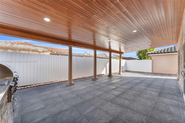 view of patio / terrace with a fenced backyard and area for grilling