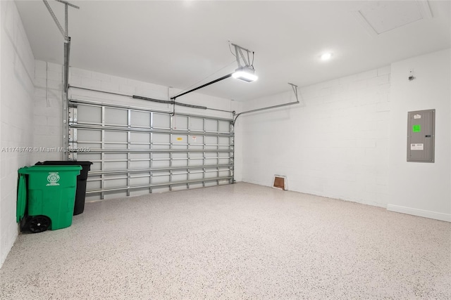 garage with electric panel and a garage door opener