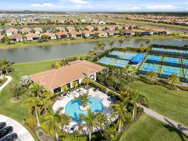 aerial view featuring a residential view and a water view