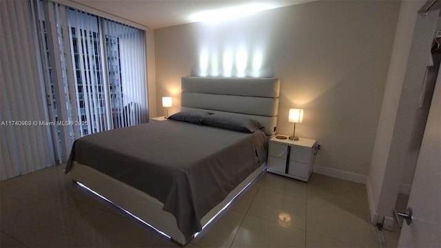 tiled bedroom with baseboards