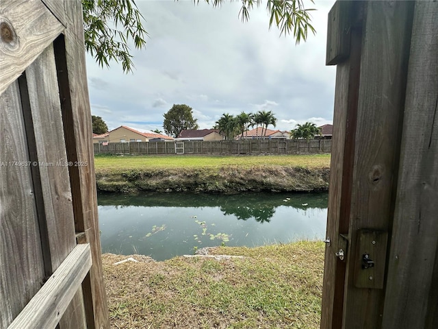 water view featuring fence