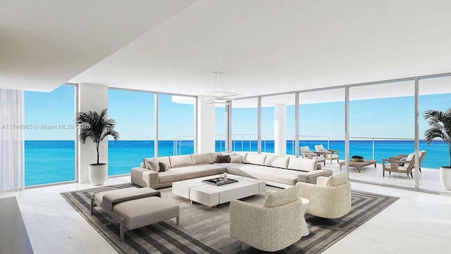 living area featuring a water view and floor to ceiling windows