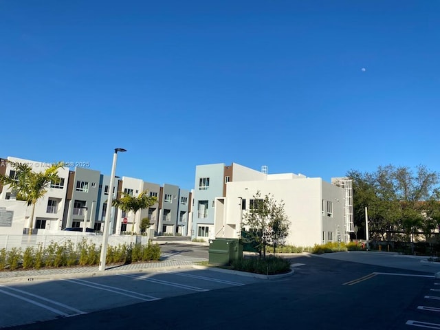 2561 NE 193rd St Unit 1202, Miami, FL 33180 - view of street featuring a residential view, curbs, and street lights