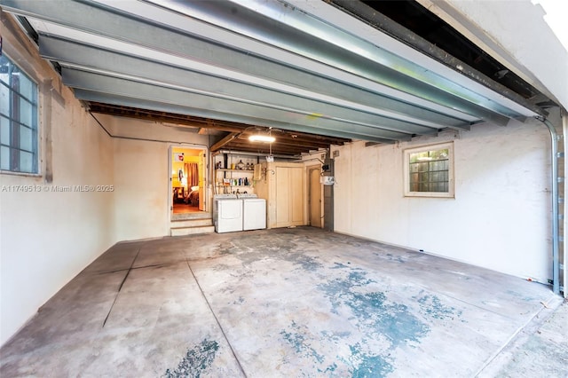 garage with separate washer and dryer