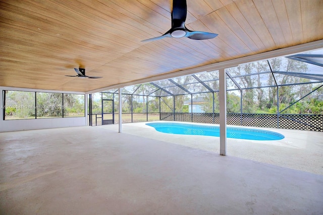 pool featuring a ceiling fan, a lanai, and a patio area