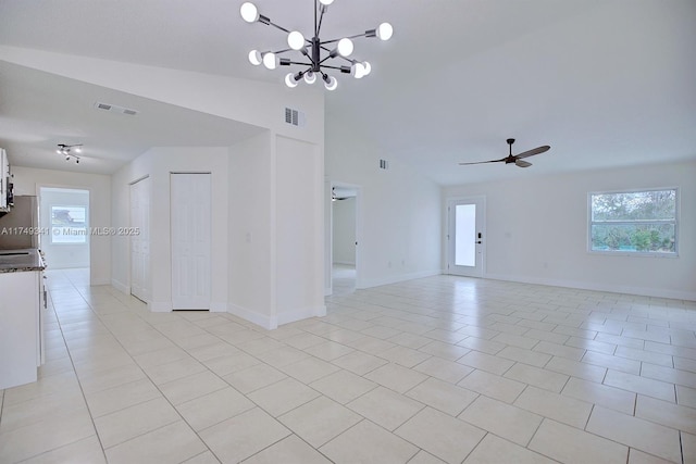 spare room featuring visible vents, baseboards, and light tile patterned floors