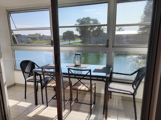 67 Berkshire Unit 67-C, West Palm Beach, FL 33417 - sunroom with a water view