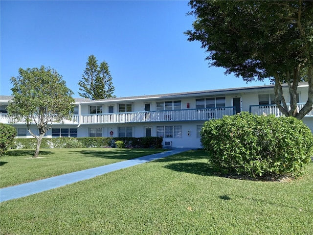 exterior space featuring a front lawn