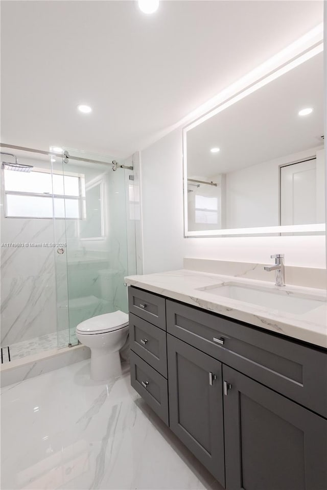 full bathroom with a marble finish shower, toilet, marble finish floor, vanity, and recessed lighting