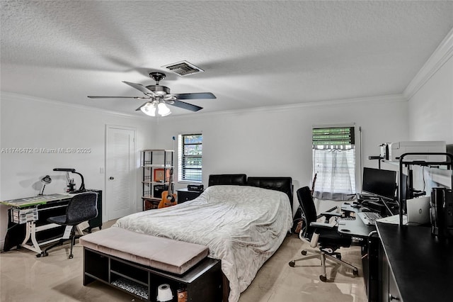 bedroom featuring a textured ceiling, visible vents, and ornamental molding