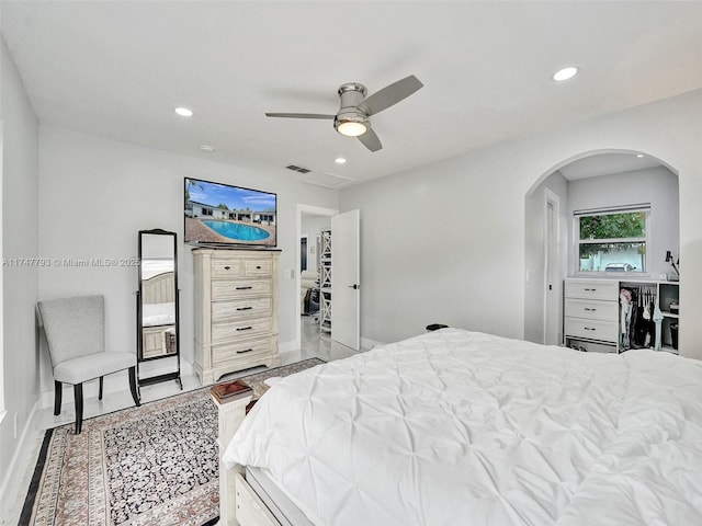 3204 Robbins Rd, Pompano Beach, FL 33062 - bedroom with arched walkways, baseboards, recessed lighting, and ceiling fan