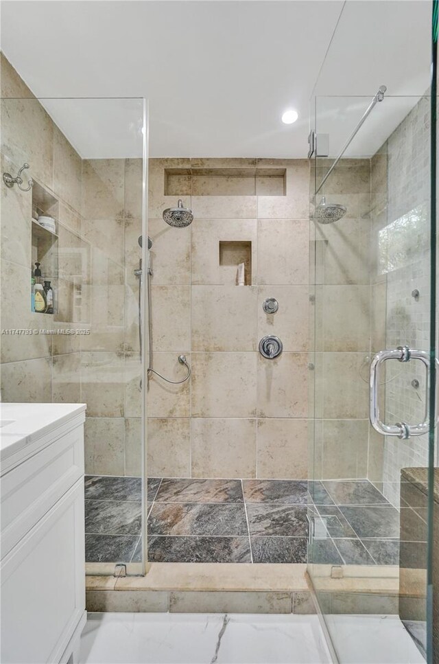 3204 Robbins Rd, Pompano Beach, FL 33062 - bathroom with a shower stall, vanity, and recessed lighting