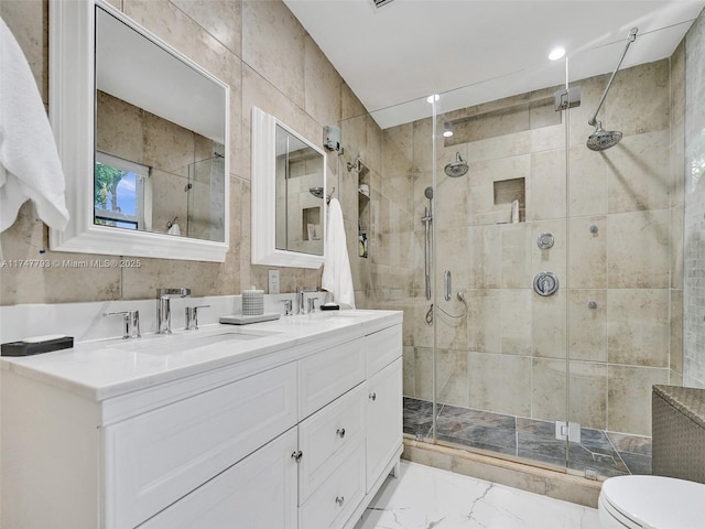 3204 Robbins Rd, Pompano Beach, FL 33062 - bathroom featuring a shower stall, toilet, double vanity, marble finish flooring, and recessed lighting