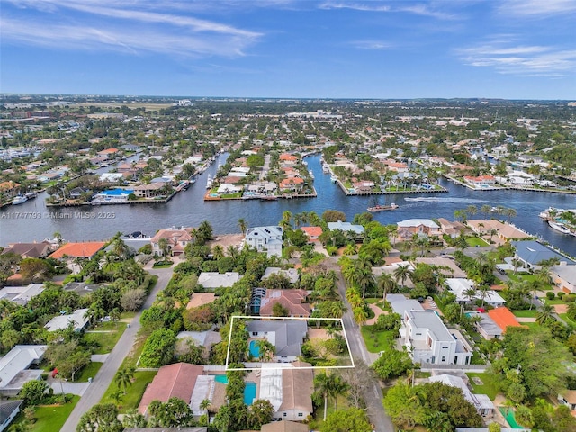3204 Robbins Rd, Pompano Beach, FL 33062 - aerial view of residential area featuring property boundaries highlighted and a nearby body of water
