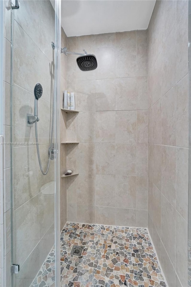 3204 Robbins Rd, Pompano Beach, FL 33062 - full bathroom with a shower stall and stone finish floors