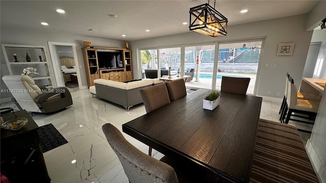 3204 Robbins Rd, Pompano Beach, FL 33062 - dining area with light marble finish flooring, recessed lighting, and a chandelier