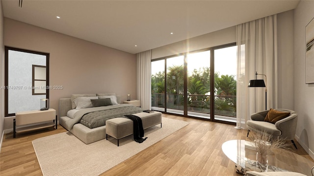 bedroom featuring light wood-type flooring and access to exterior