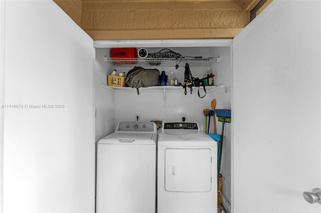 laundry area with laundry area and washing machine and dryer