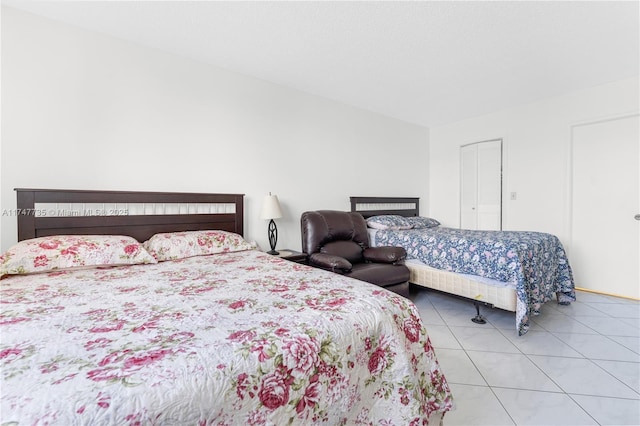 bedroom with tile patterned flooring