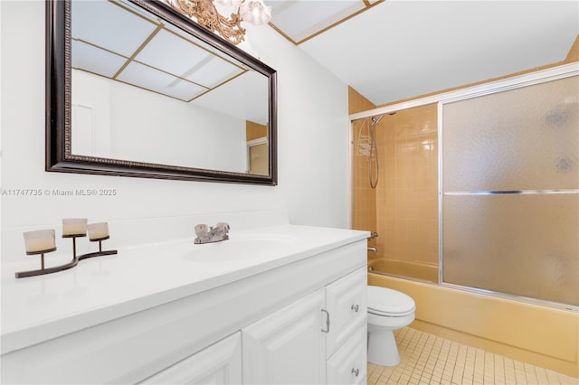 full bathroom featuring enclosed tub / shower combo, tile patterned flooring, vanity, and toilet