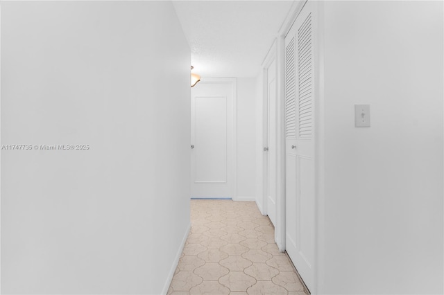 hallway with baseboards