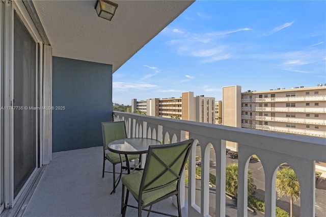 balcony featuring a city view