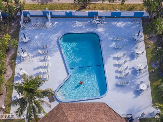 community pool with a patio